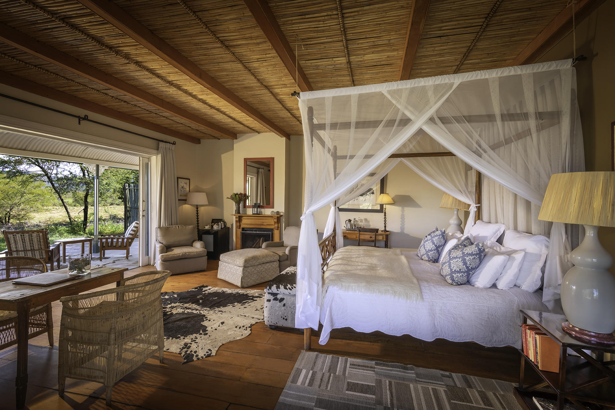 Each Karoo Suite is spacious with bedroom area and seating area with fireplace